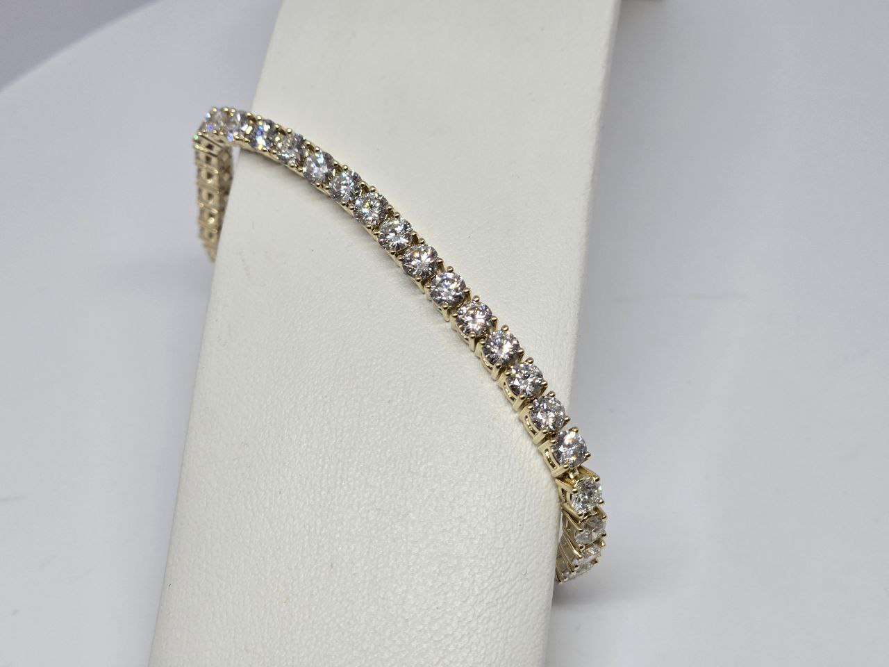 Yellow gold diamond bracelet with continuous stone setting