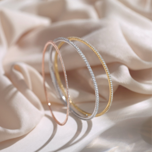 gold, silver, and rose gold bracelets