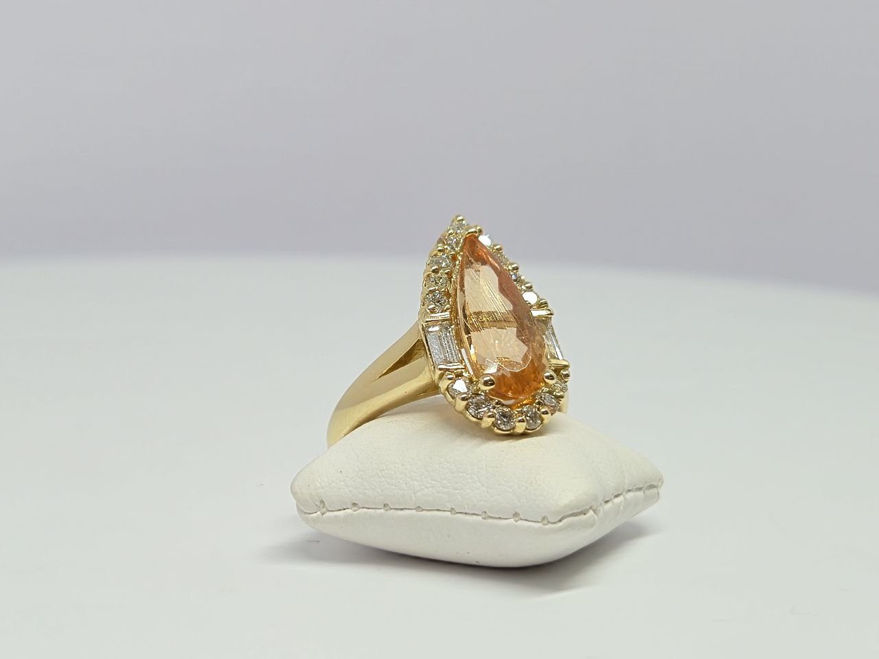 Round amethyst stud earrings with diamond halos in two-tone gold